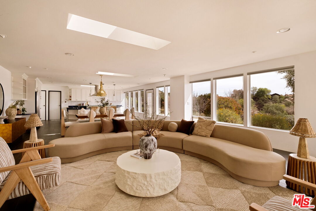 7401 Studio Road Canoga Park, CA 91304 - Photo 2 of 30 a living room with furniture and a large window