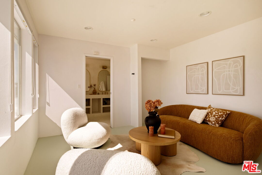 7401 Studio Road Canoga Park, CA 91304 - Photo 23 of 30 a living room with furniture and a large window