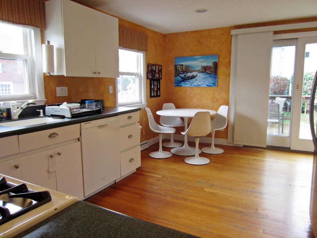 15 Yale Road Needham, MA 02494 - Photo 5 of 5 a kitchen with a sink and a stove next to a window