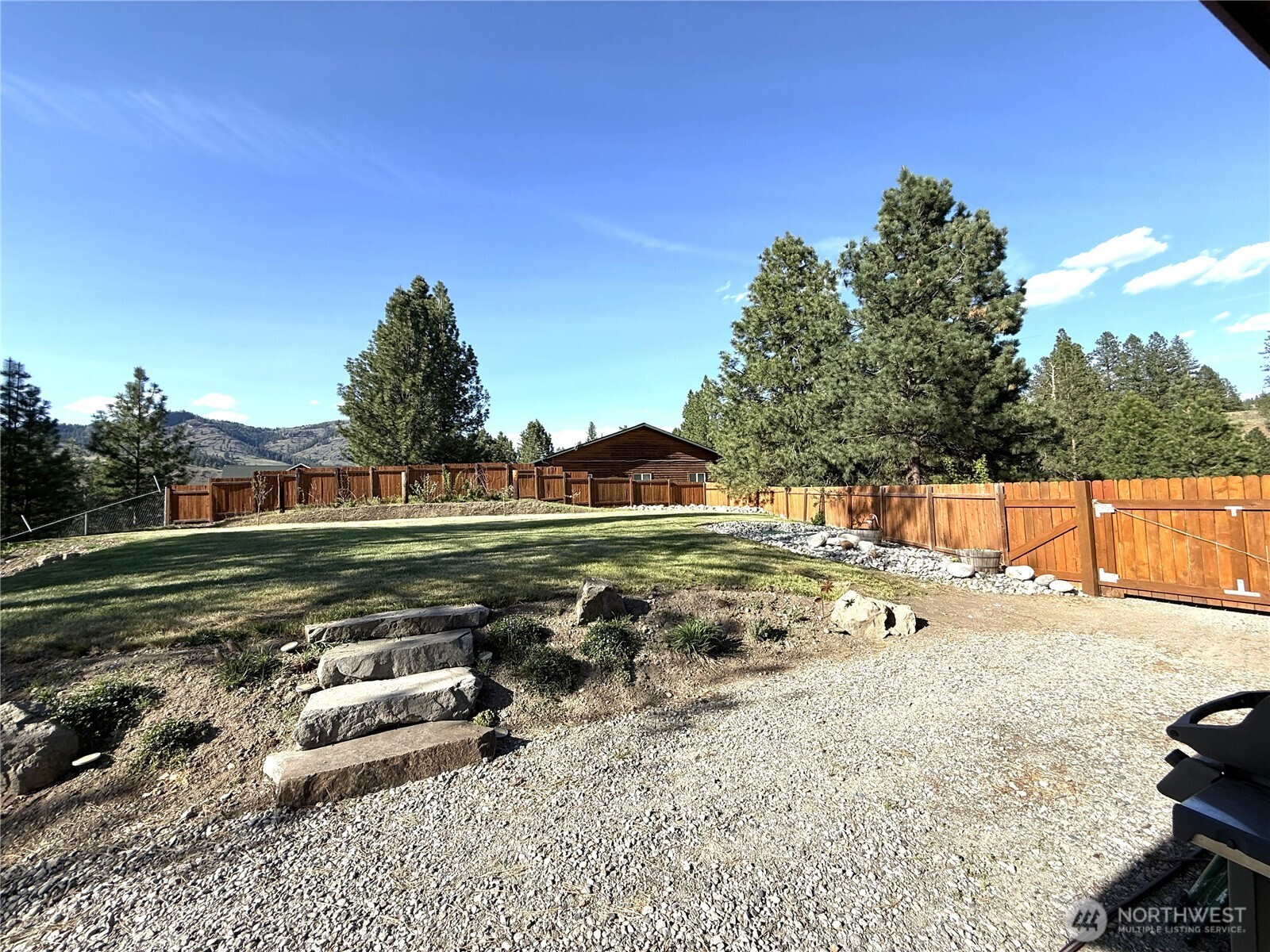 8 Julian Bay Road Republic, WA 99166 - Photo 32 of 40 a view of a backyard with a sitting area