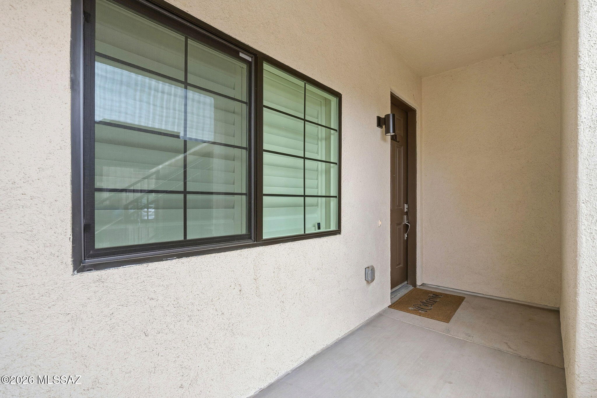 2020 East River Road, Unit 101 Tucson, AZ 85718 - Photo 12 of 12 a view of an empty room with a window