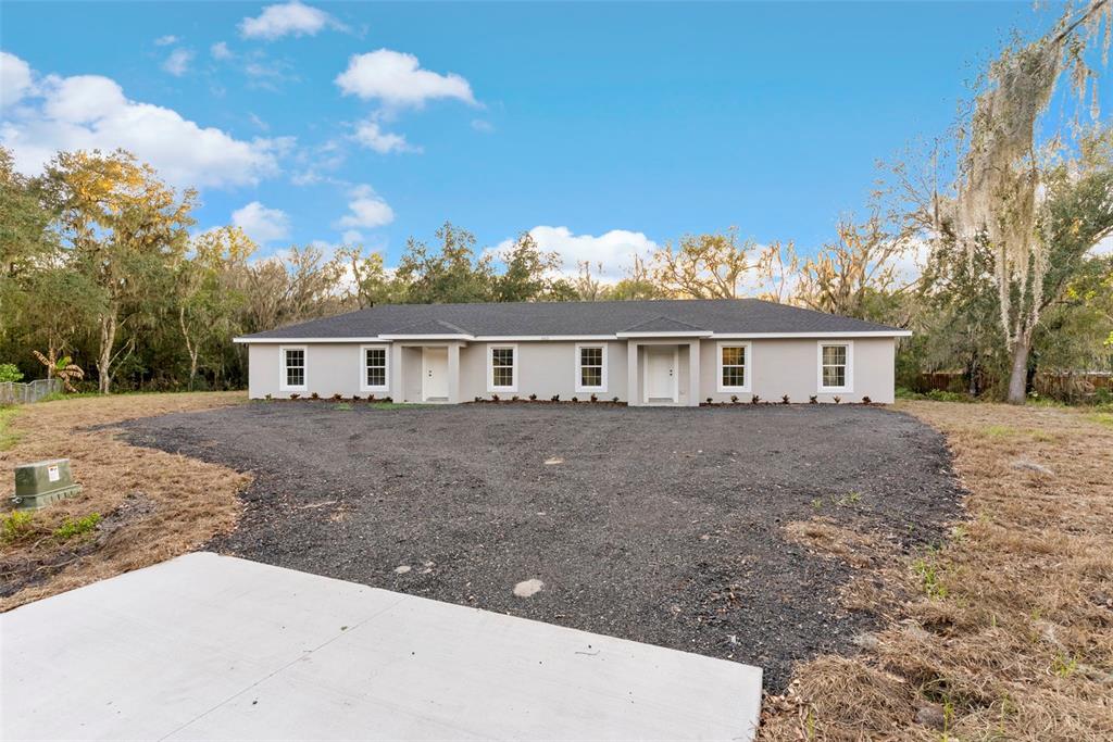 603 Moose Lodge Road, Unit A Bartow, FL 33830 - Photo 2 of 22 a front view of a house with yard