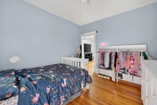 a bed room with a bed and a couch