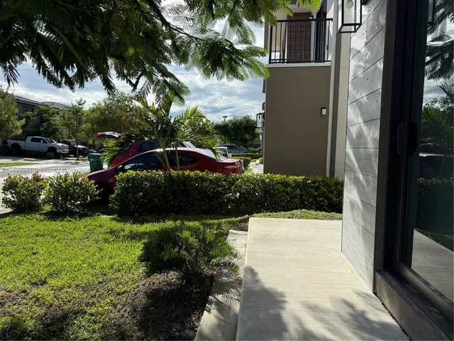 a view of swimming pool with a yard