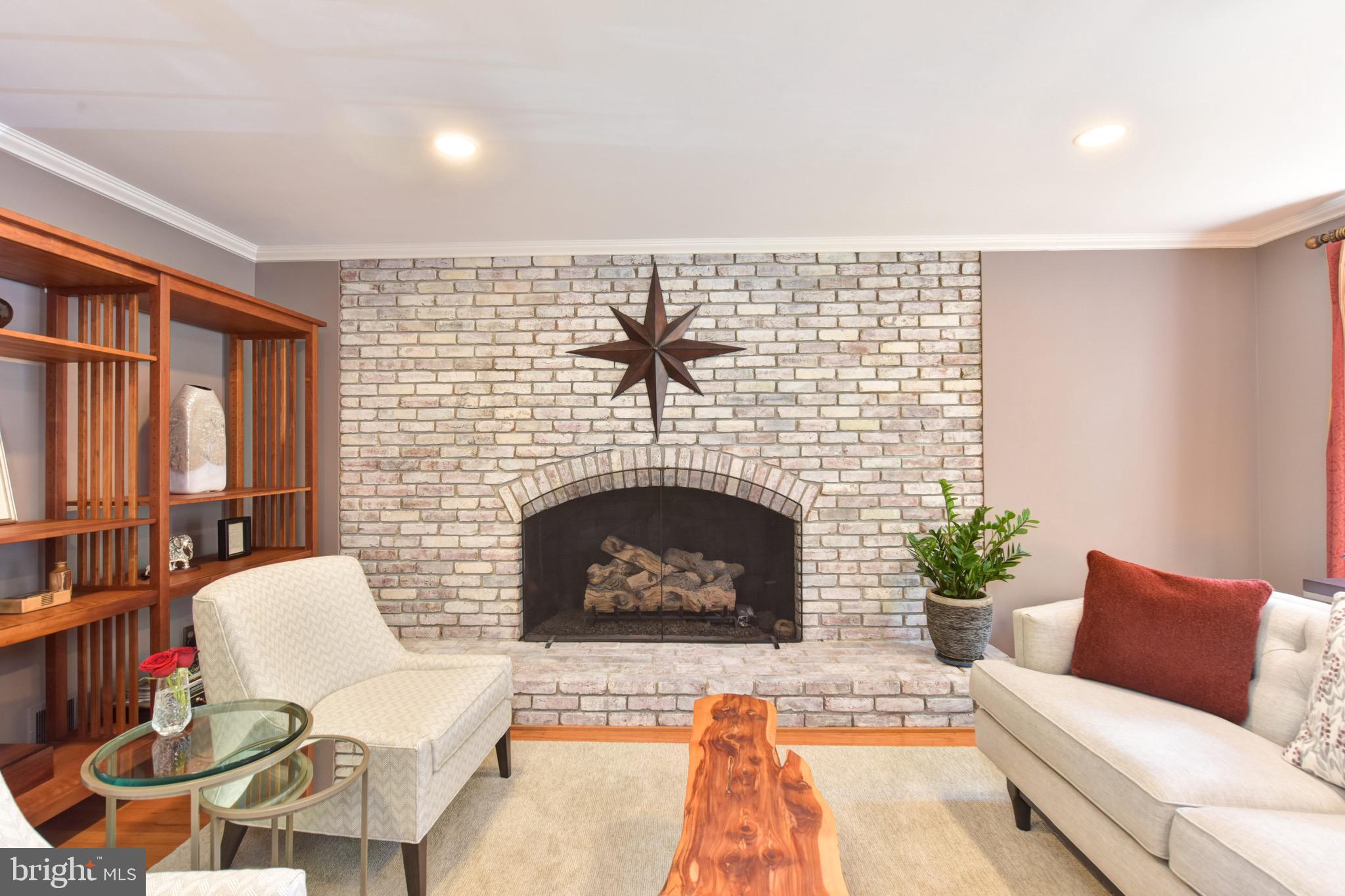 1609 Stonebridge Road Alexandria, VA 22304 - Photo 15 of 53 Welcome guests to sit by the fireplace