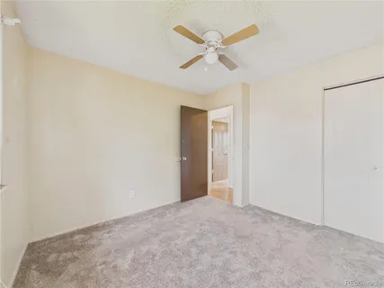 a view of a big room with carpet