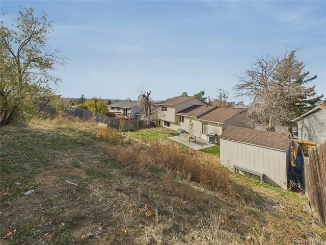 a view of a yard in front of a house