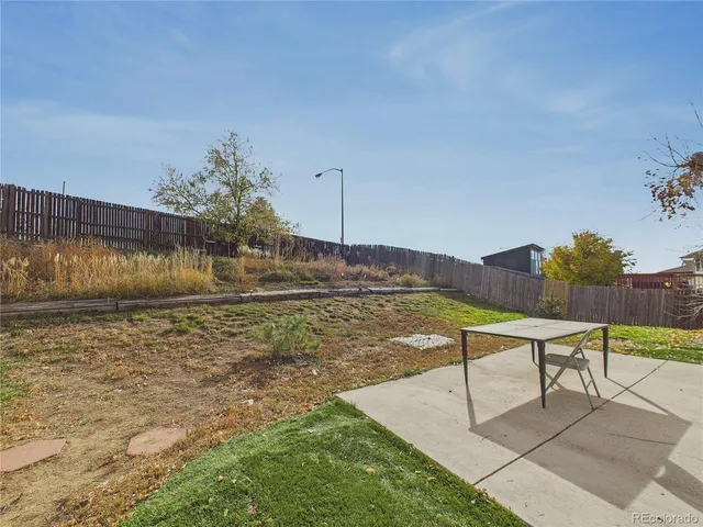 a view of a swimming pool with a lounge chairs