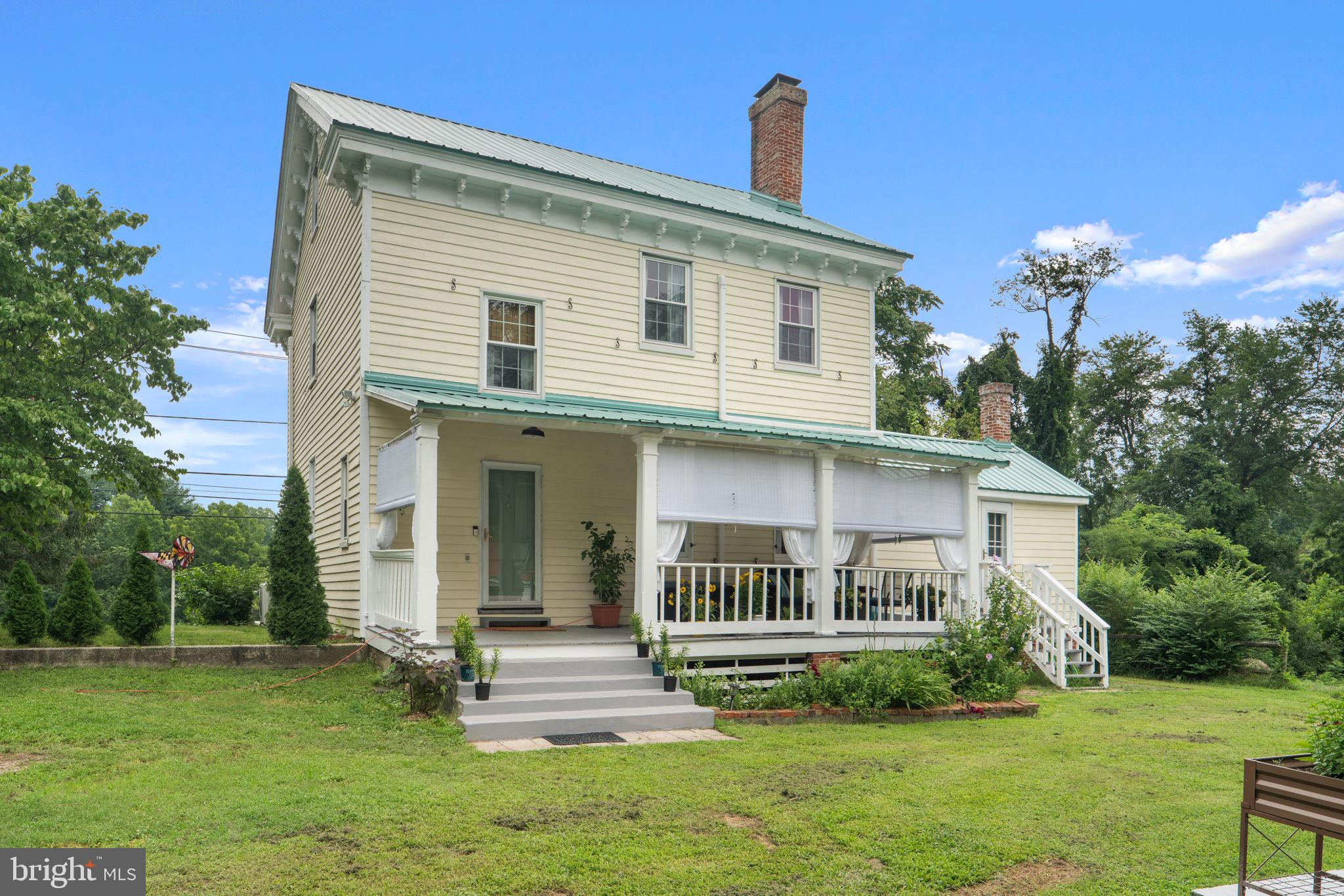 10007 Croom Road Upper Marlboro, MD 20772 - Photo 2 of 134 Back of the house w full length porch