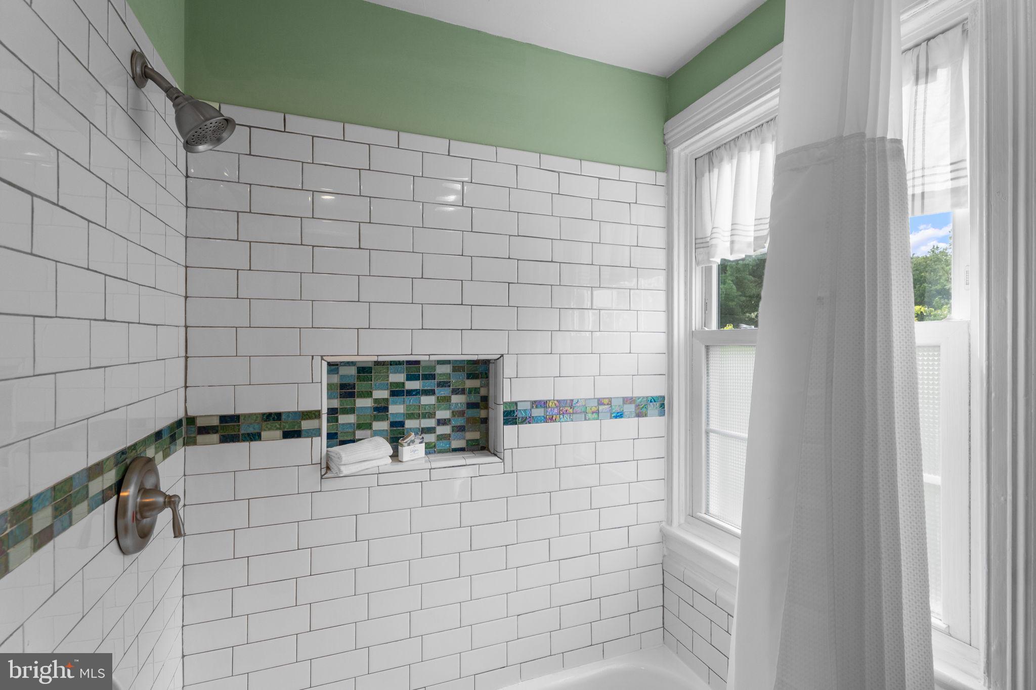 10007 Croom Road Upper Marlboro, MD 20772 - Photo 43 of 134 a bathroom with a shower
