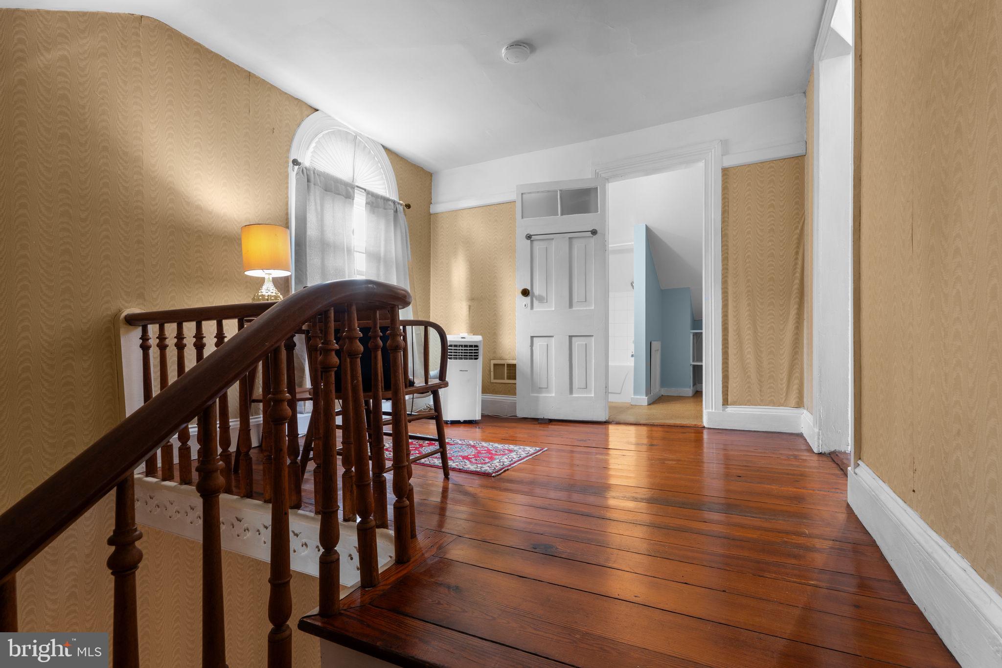 10007 Croom Road Upper Marlboro, MD 20772 - Photo 52 of 134 Third floor landing, wood floors in entire house