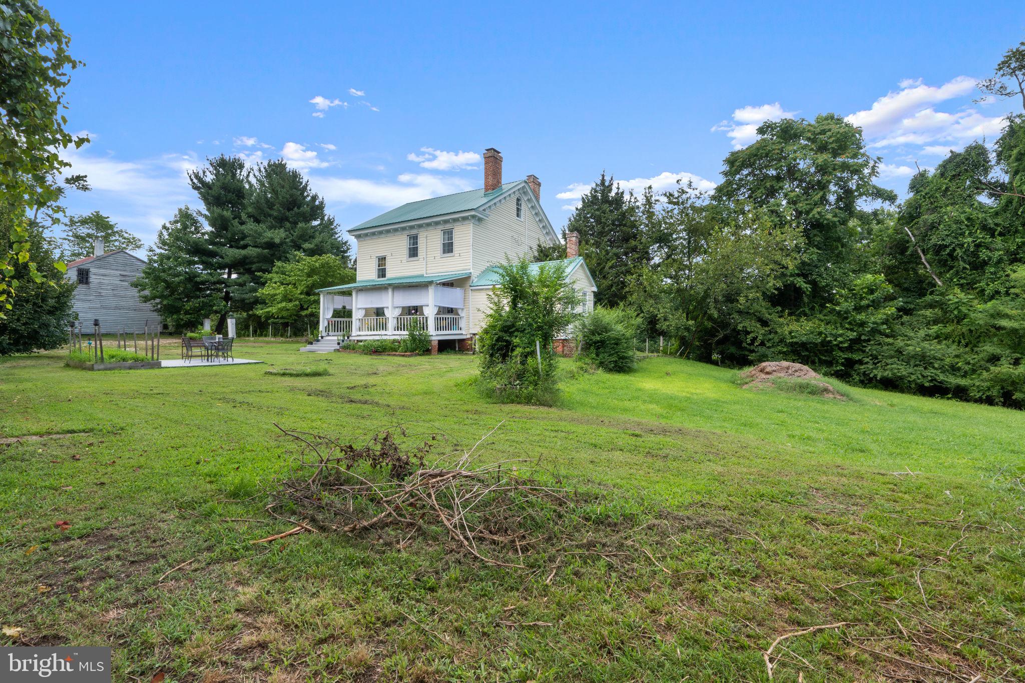 10007 Croom Road Upper Marlboro, MD 20772 - Photo 85 of 134 a view of a house with a yard