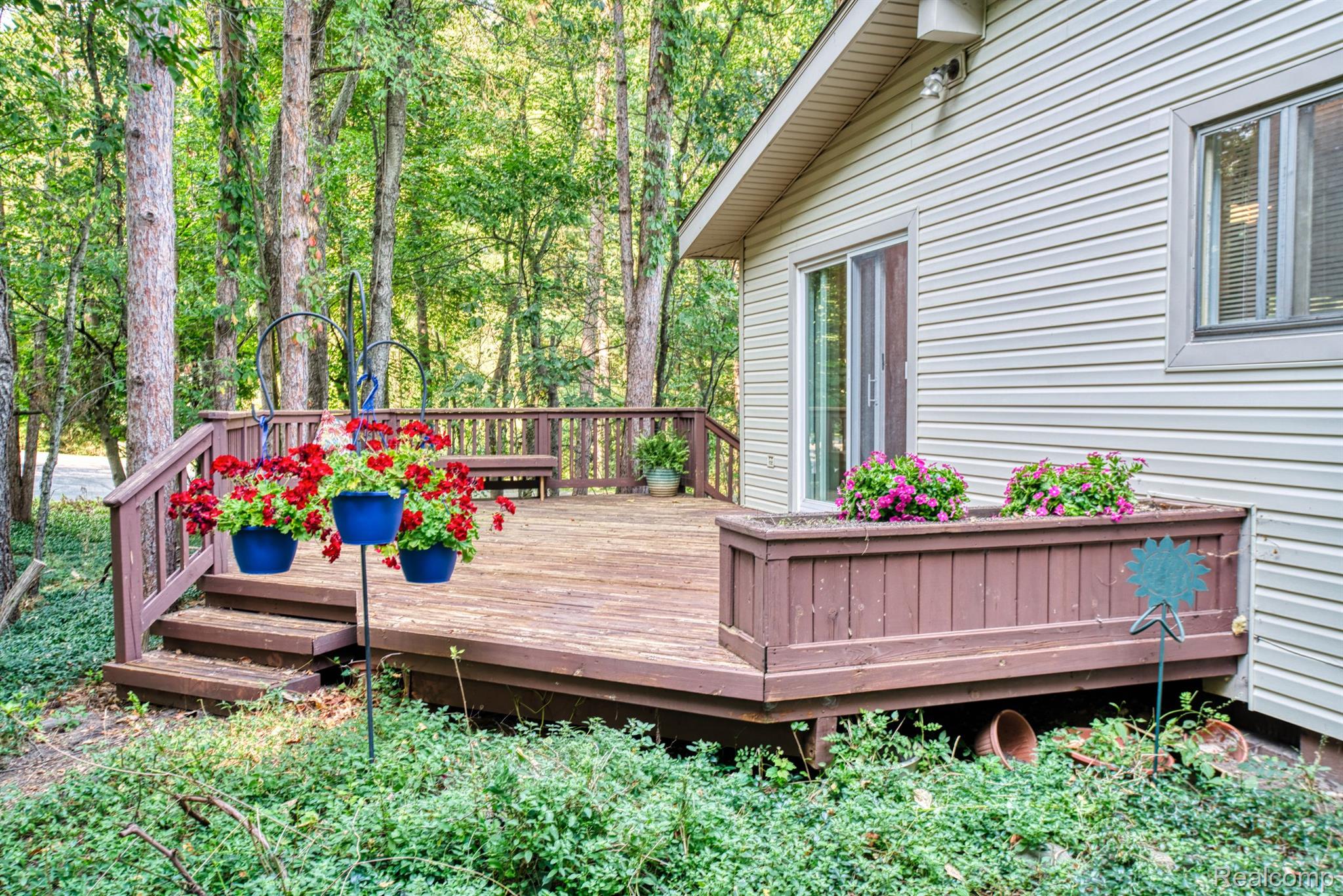 5044 Greenfield Road Brighton, MI 48114 - Photo 31 of 39 ...deck is a nice size with dual bench seating