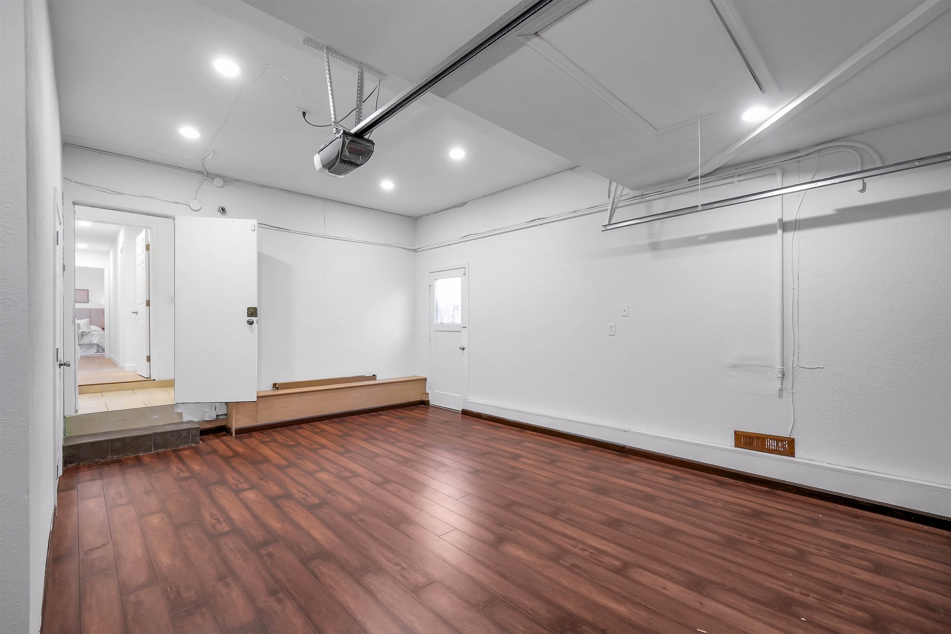 3159 Rowe Place Fremont, CA 94536 - Photo 20 of 59 an empty room with wooden floor and windows