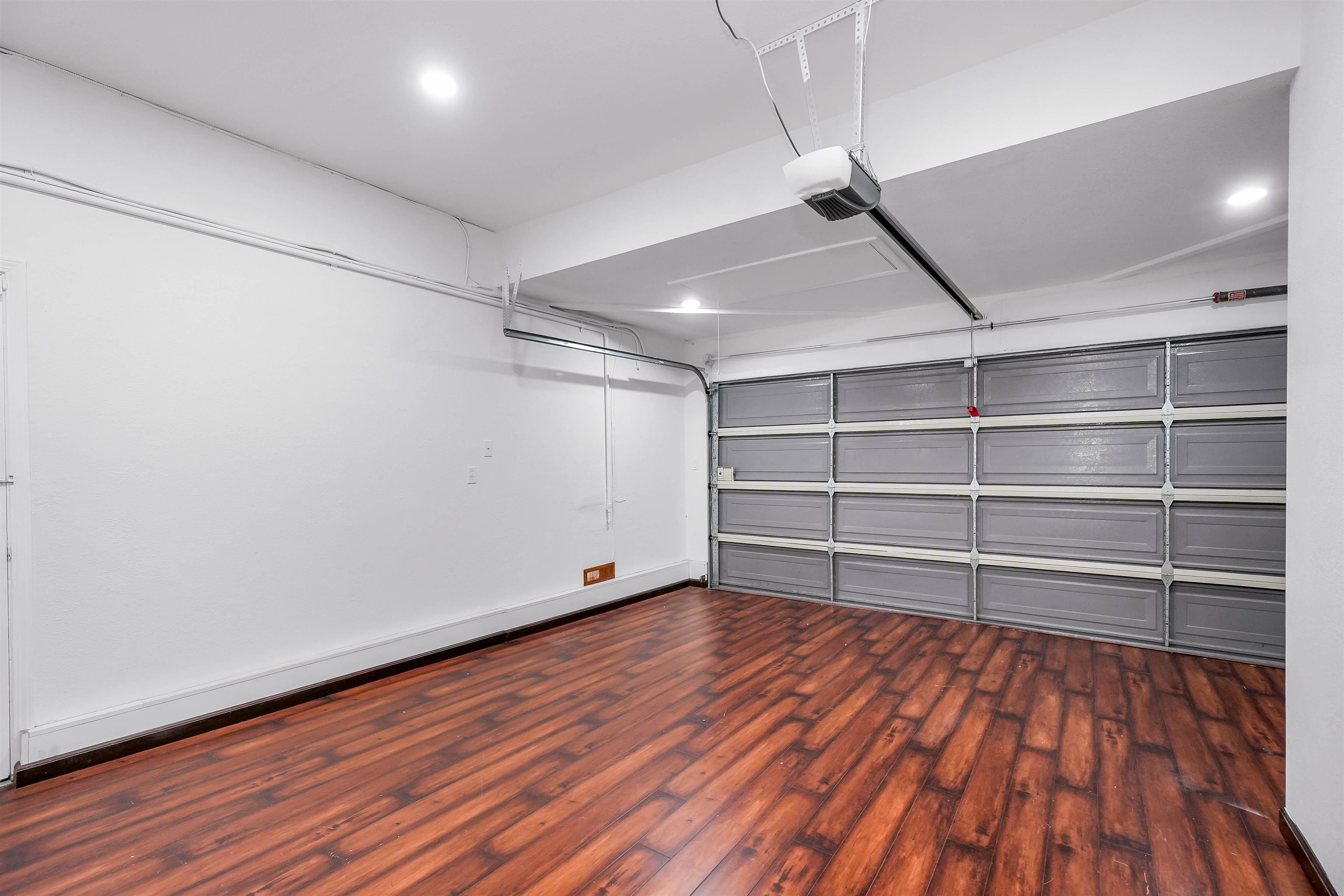 3159 Rowe Place Fremont, CA 94536 - Photo 22 of 59 a view of an empty room with wooden floor and a window