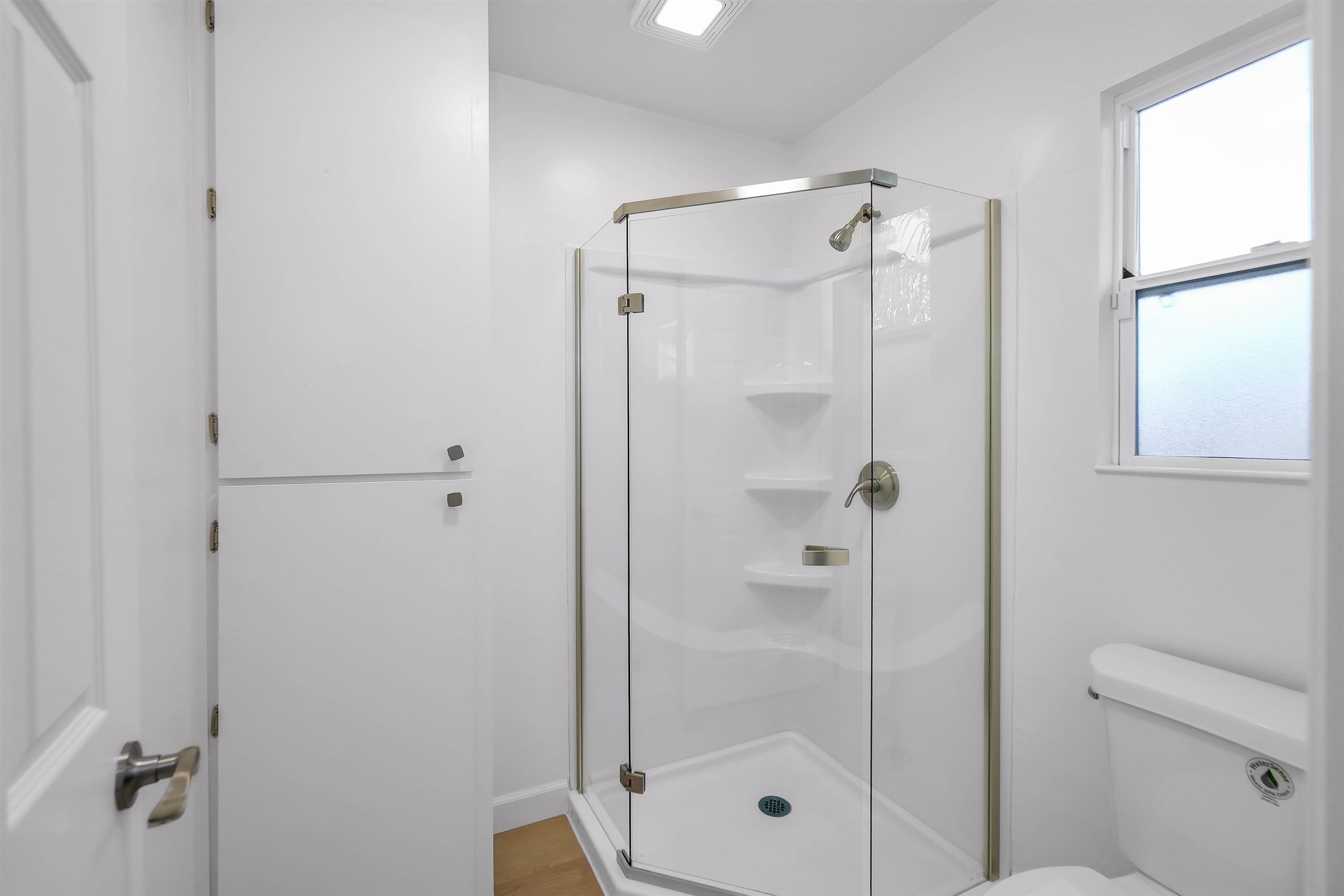 3159 Rowe Place Fremont, CA 94536 - Photo 24 of 59 a bathroom with a shower and a toilet