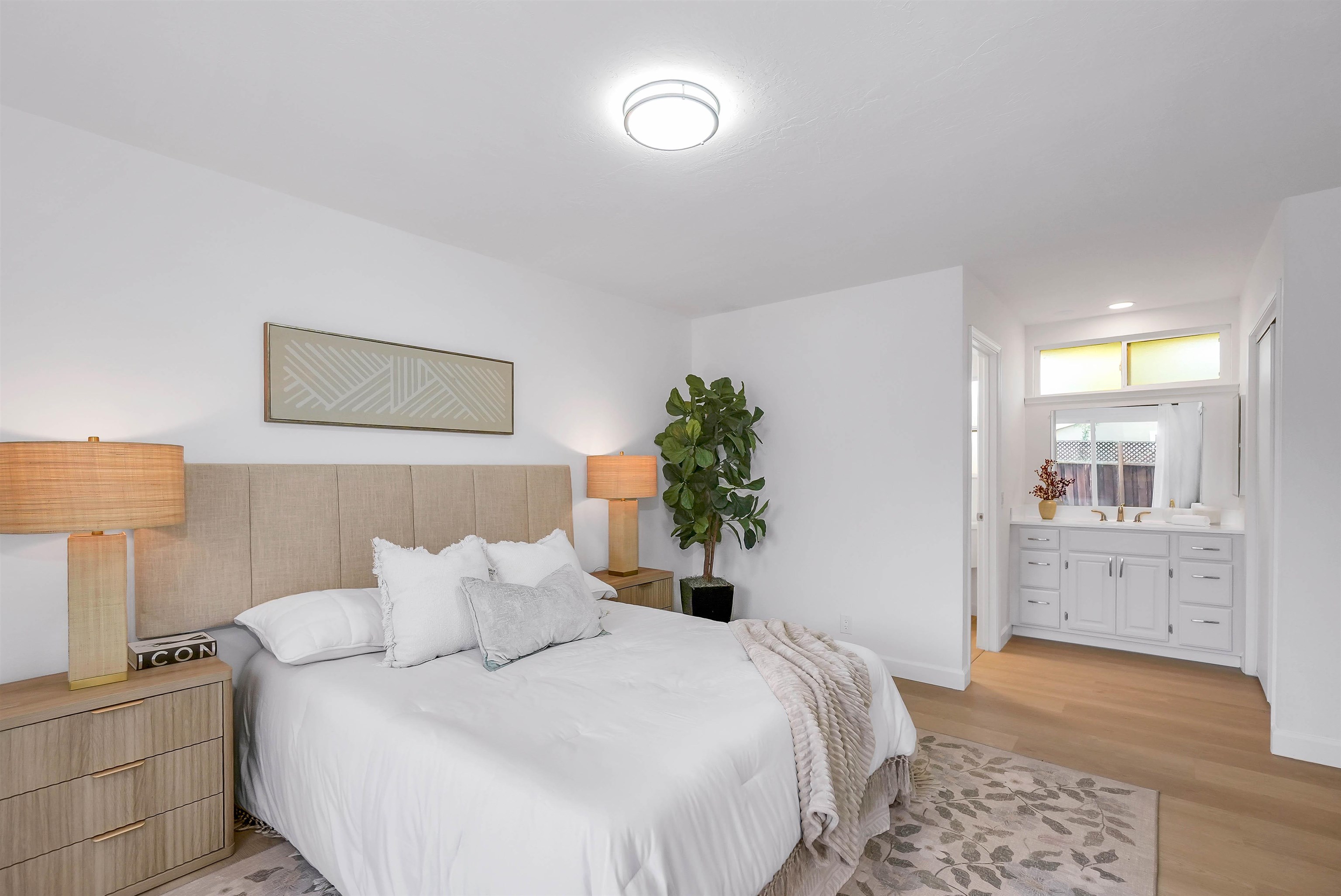 3159 Rowe Place Fremont, CA 94536 - Photo 26 of 59 a bedroom with a bed and a potted plant