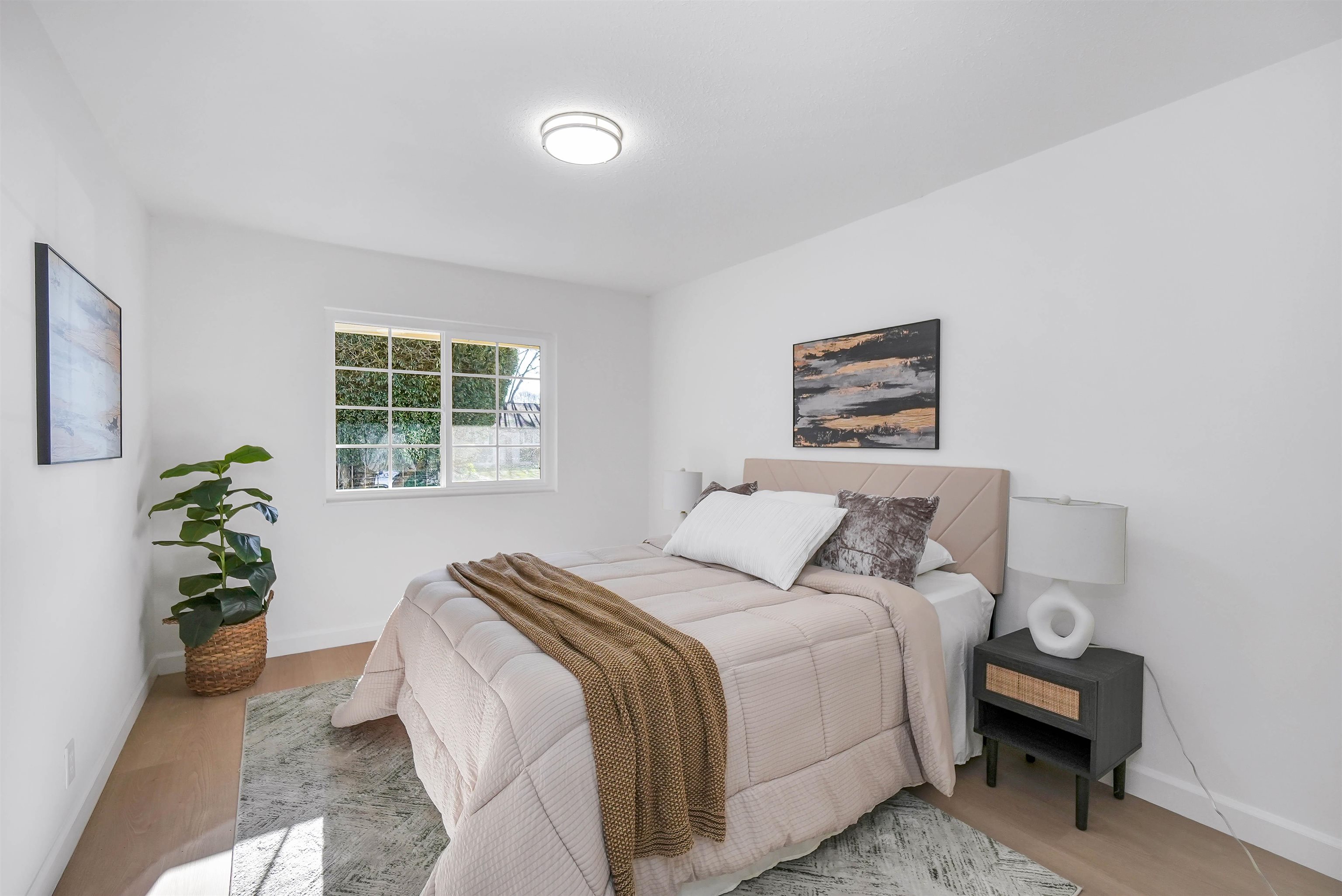 3159 Rowe Place Fremont, CA 94536 - Photo 33 of 59 a bedroom with a bed and a potted plant