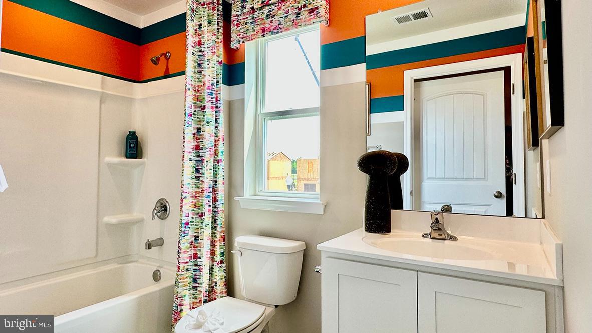 1152 Wintermead Loop Salisbury, MD 21801 - Photo 29 of 32 a bathroom with a sink and a mirror