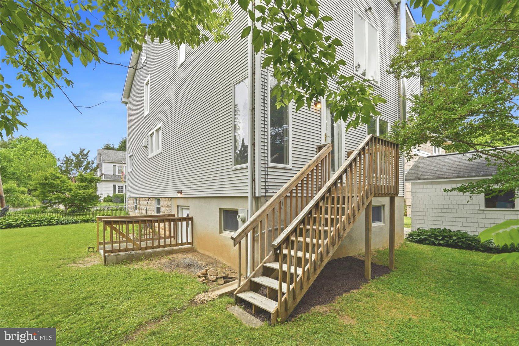 24 Normal Terrace Baltimore, MD 21286 - Photo 21 of 37 a view of a deck with a big yard potted plants and large tree