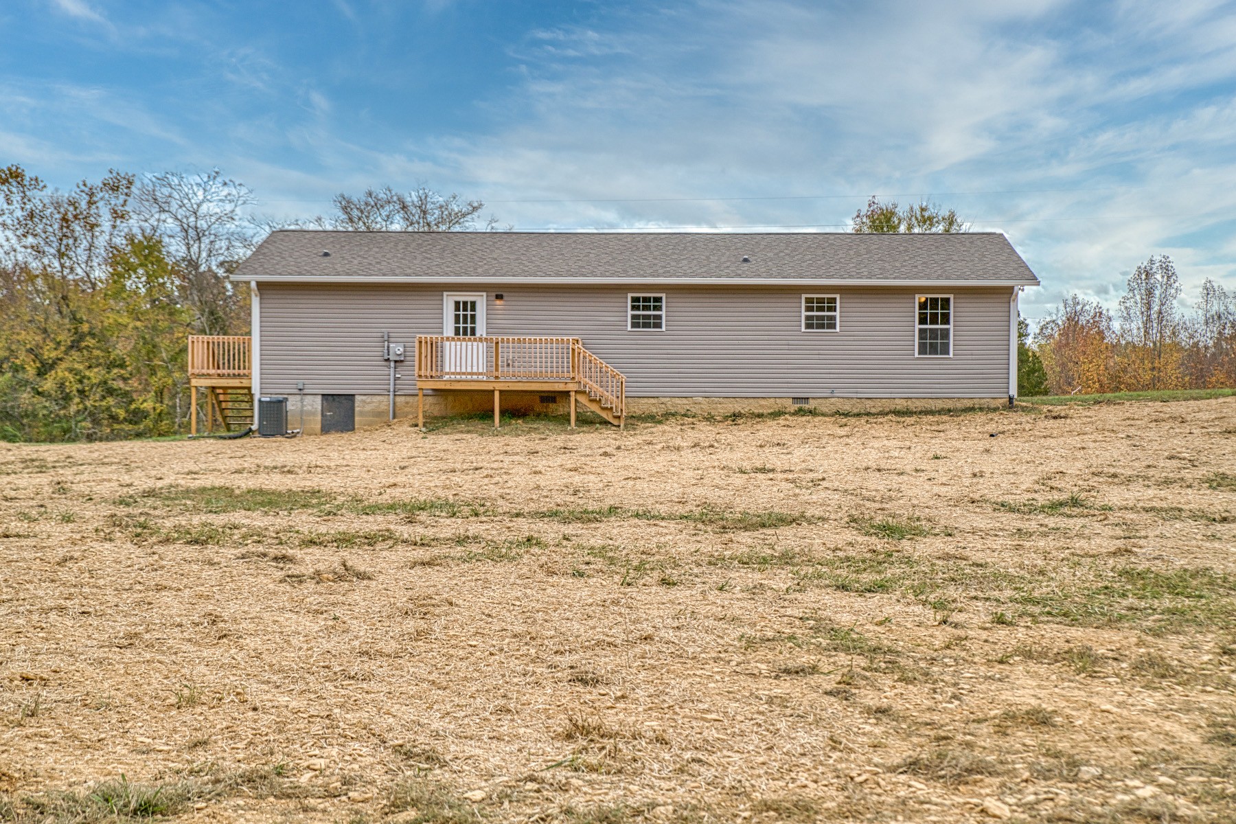 10309 Goff Ridge Road Baxter, TN 38544 - Photo 26 of 31 a house with yard in front of it