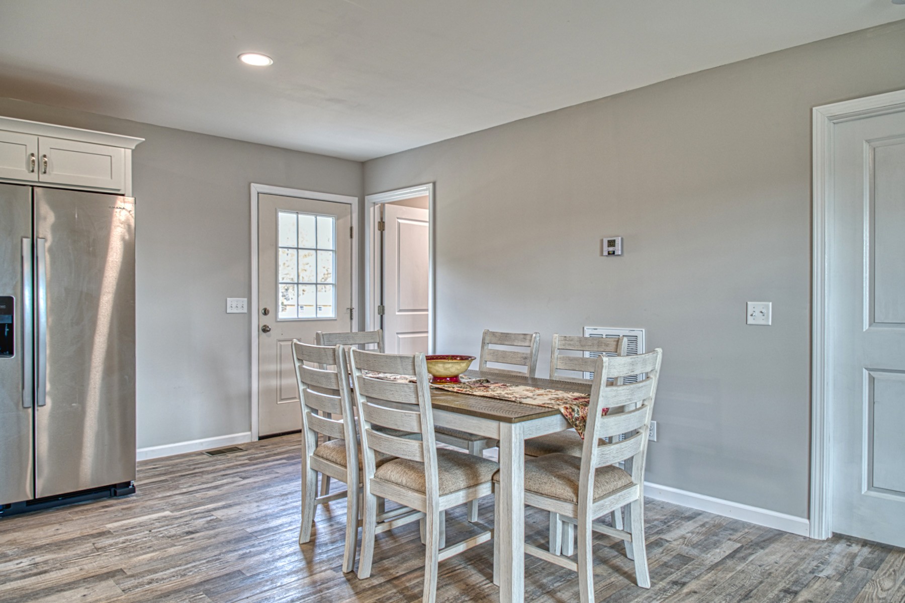 10309 Goff Ridge Road Baxter, TN 38544 - Photo 10 of 31 a dining room with furniture and wooden floor