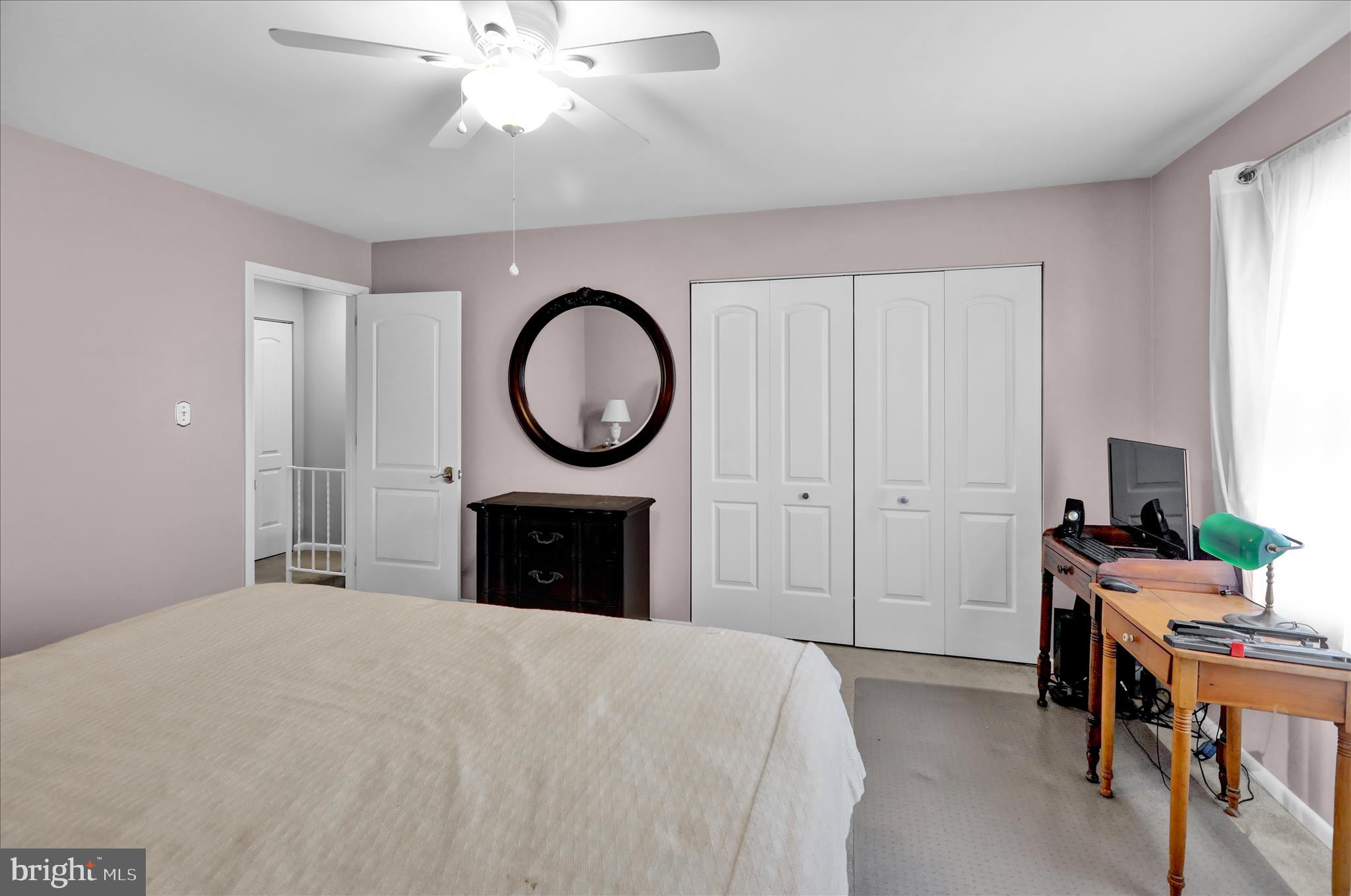 6 Alpine Court Reading, PA 19606 - Photo 16 of 22 a bedroom with a bed and a chandelier