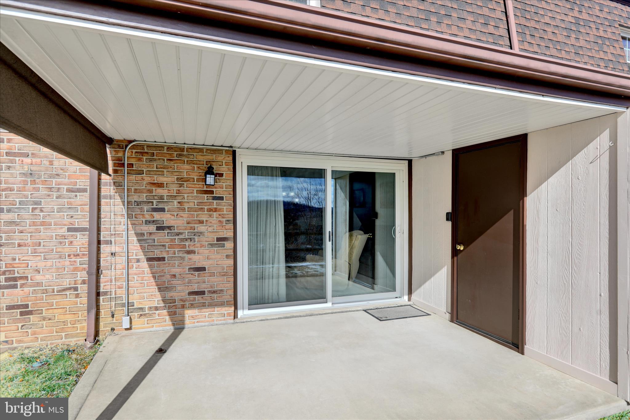 6 Alpine Court Reading, PA 19606 - Photo 21 of 22 a view of a house with a door and wooden walls