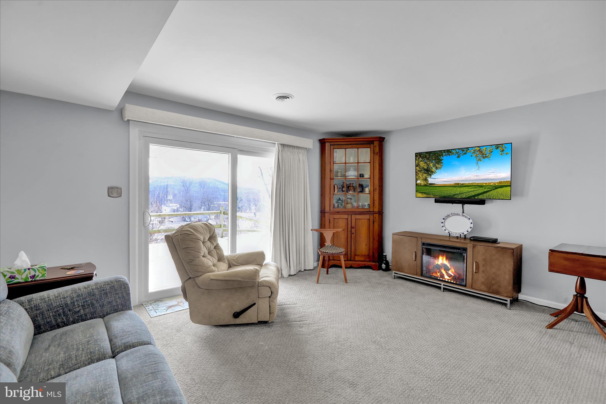 6 Alpine Court Reading, PA 19606 - Photo 6 of 22 a living room with furniture and a flat screen tv