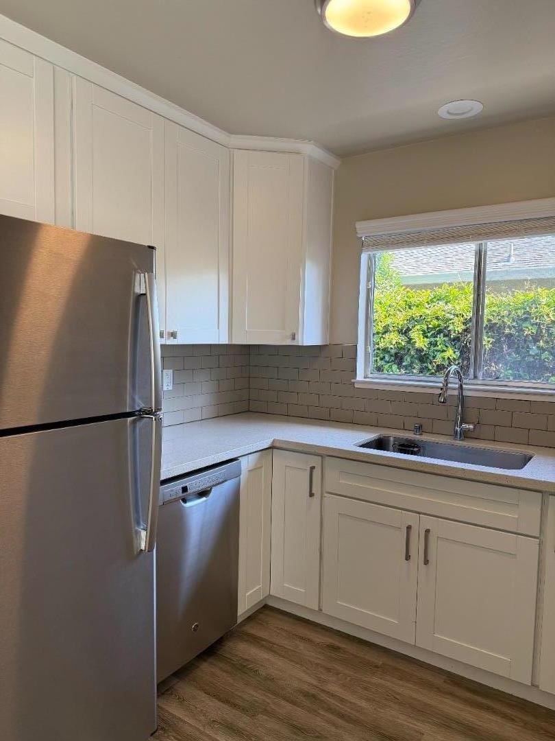 805 Devoto Street Mountain View, CA 94041 - Photo 2 of 3 a kitchen with a refrigerator sink and window