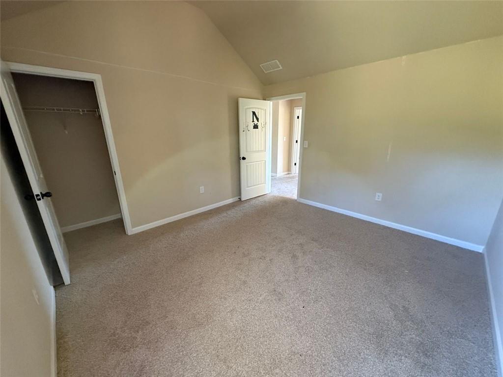 143 Massey Lane Locust Grove, GA 30248 - Photo 14 of 17 an empty room with windows