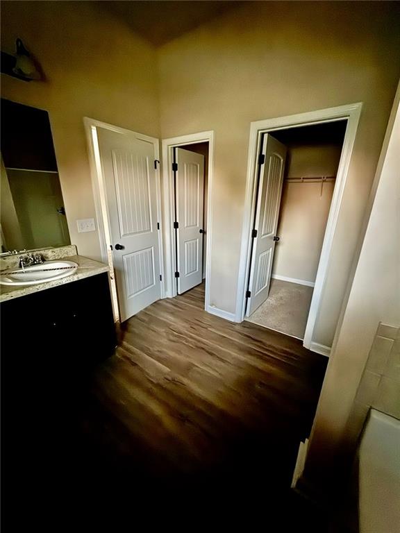 143 Massey Lane Locust Grove, GA 30248 - Photo 9 of 17 a bedroom with a bed and a flat screen tv