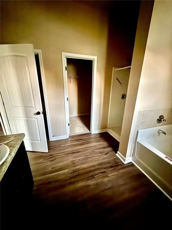 143 Massey Lane Locust Grove, GA 30248 - Photo 10 of 17 a view of an empty room and wooden floor