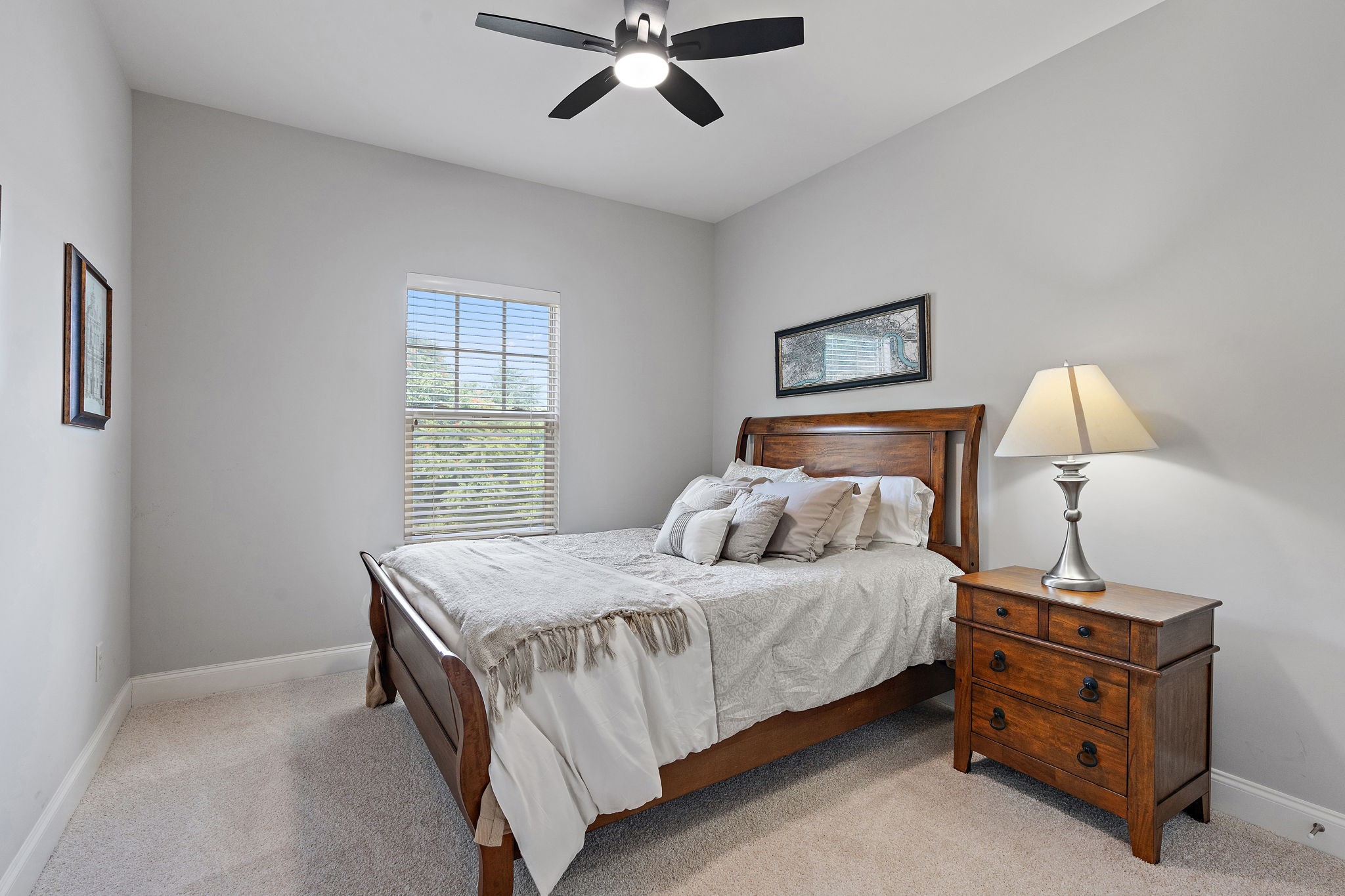 916 Gateway Court Franklin, TN 37069 - Photo 17 of 26 a bedroom with a bed and a lamp on dresser