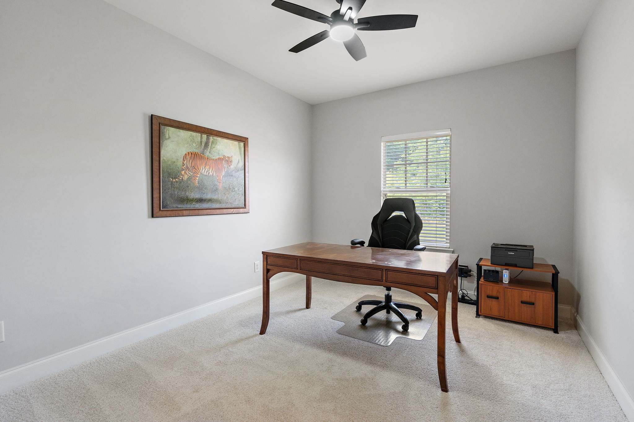 916 Gateway Court Franklin, TN 37069 - Photo 19 of 26 a workspace with a desk and a window