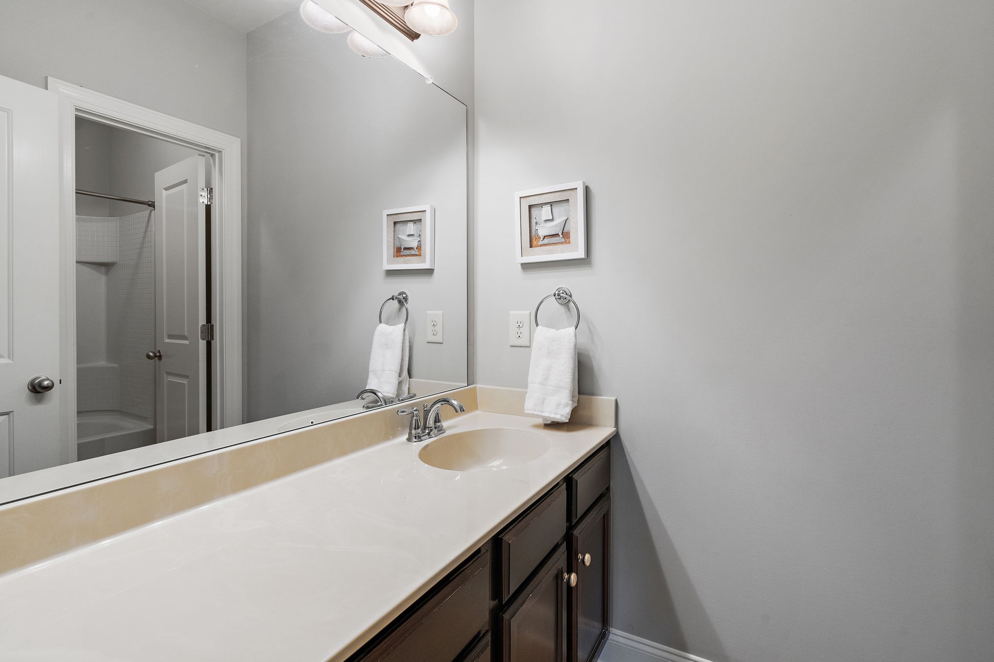 916 Gateway Court Franklin, TN 37069 - Photo 20 of 26 a bathroom with a sink and a mirror
