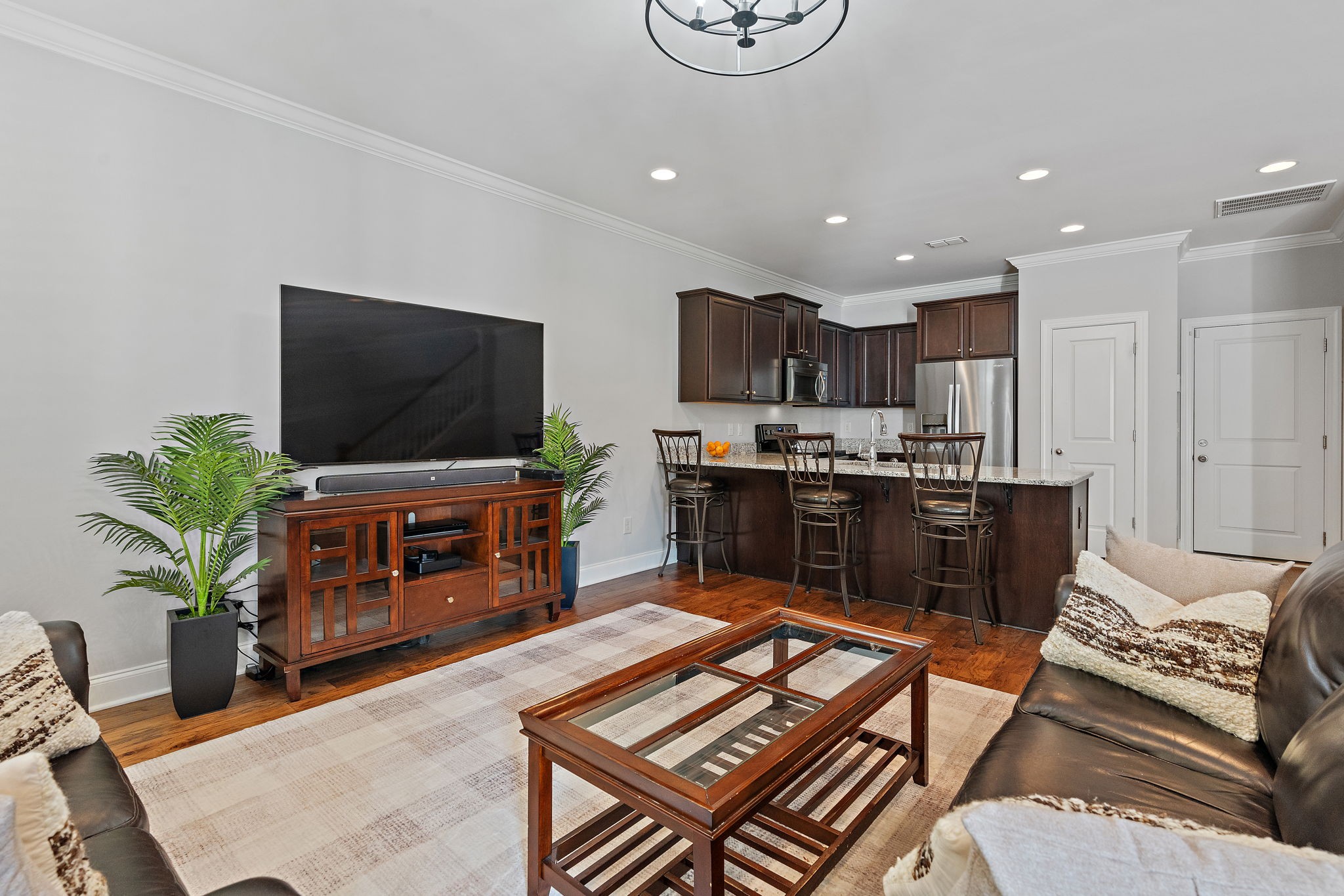 916 Gateway Court Franklin, TN 37069 - Photo 5 of 26 a living room with furniture and a flat screen tv