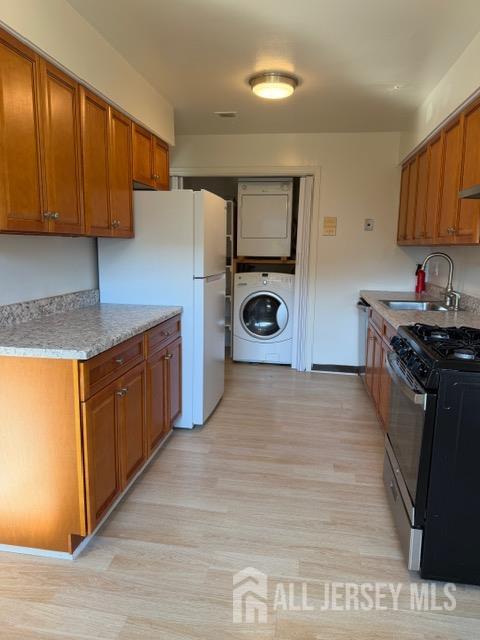 1508 Raspberry Court Edison, NJ 08817 - Photo 6 of 11 a kitchen with a stove a sink and a refrigerator