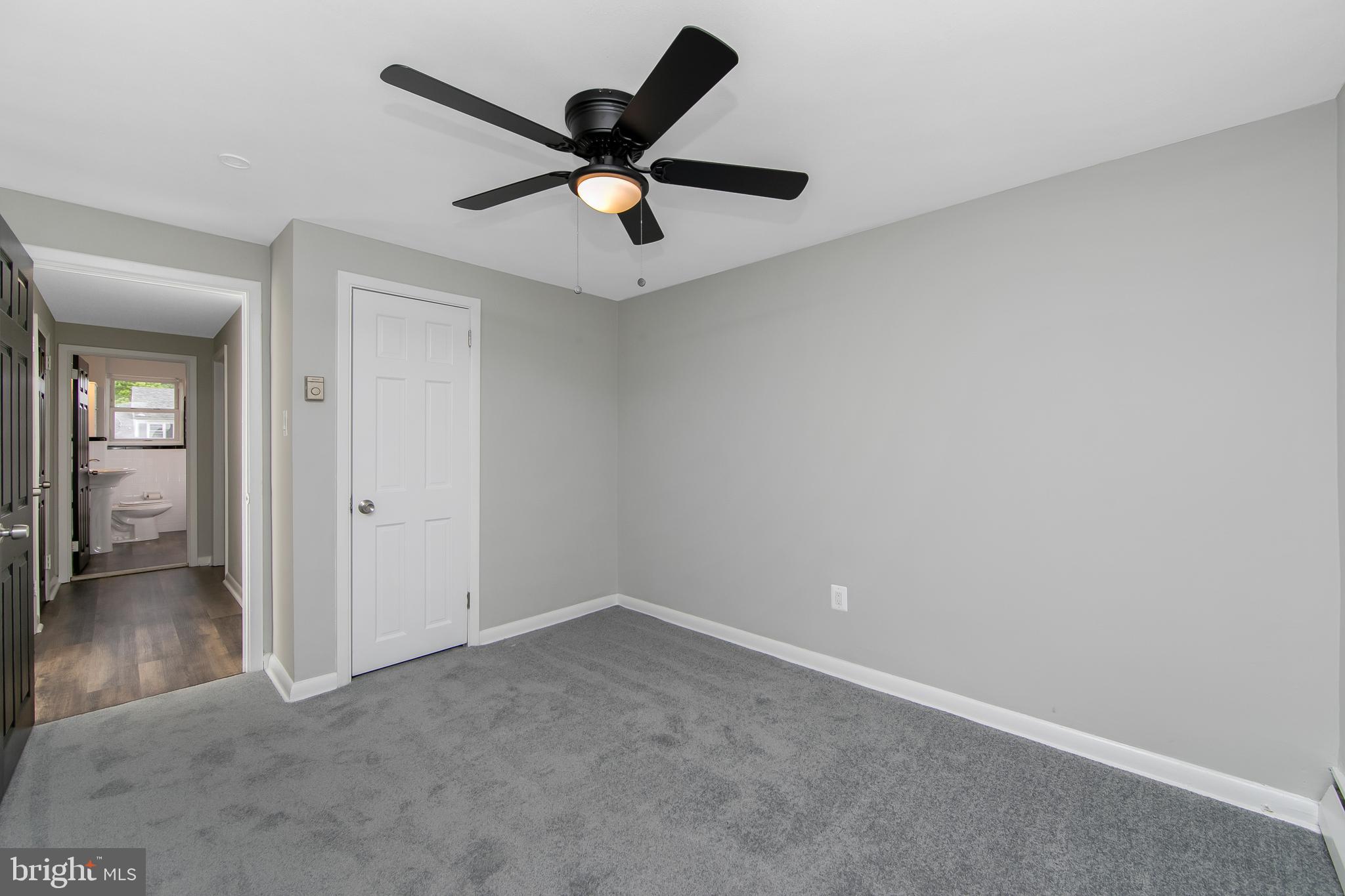 334 Parham Road Springfield, PA 19064 - Photo 19 of 41 an empty room with closet and a chandelier fan
