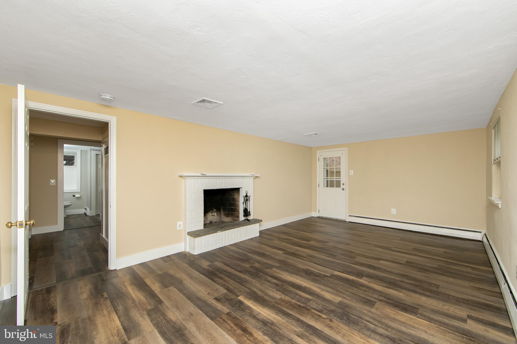 334 Parham Road Springfield, PA 19064 - Photo 23 of 41 a view of empty room with wooden floor