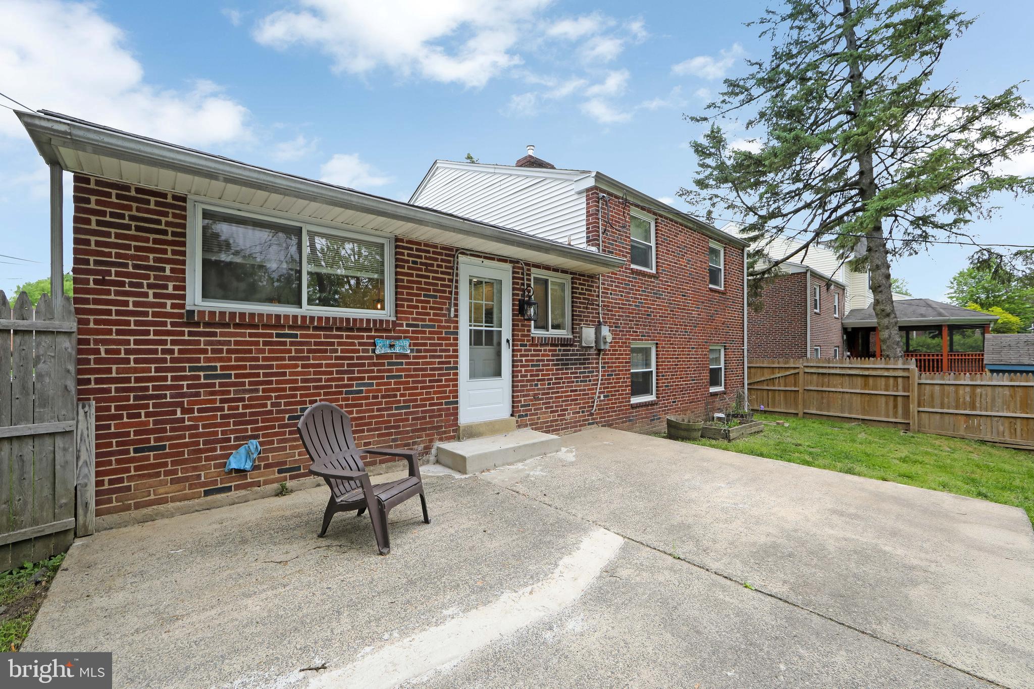 334 Parham Road Springfield, PA 19064 - Photo 30 of 41 a backyard of a house with outdoor seating