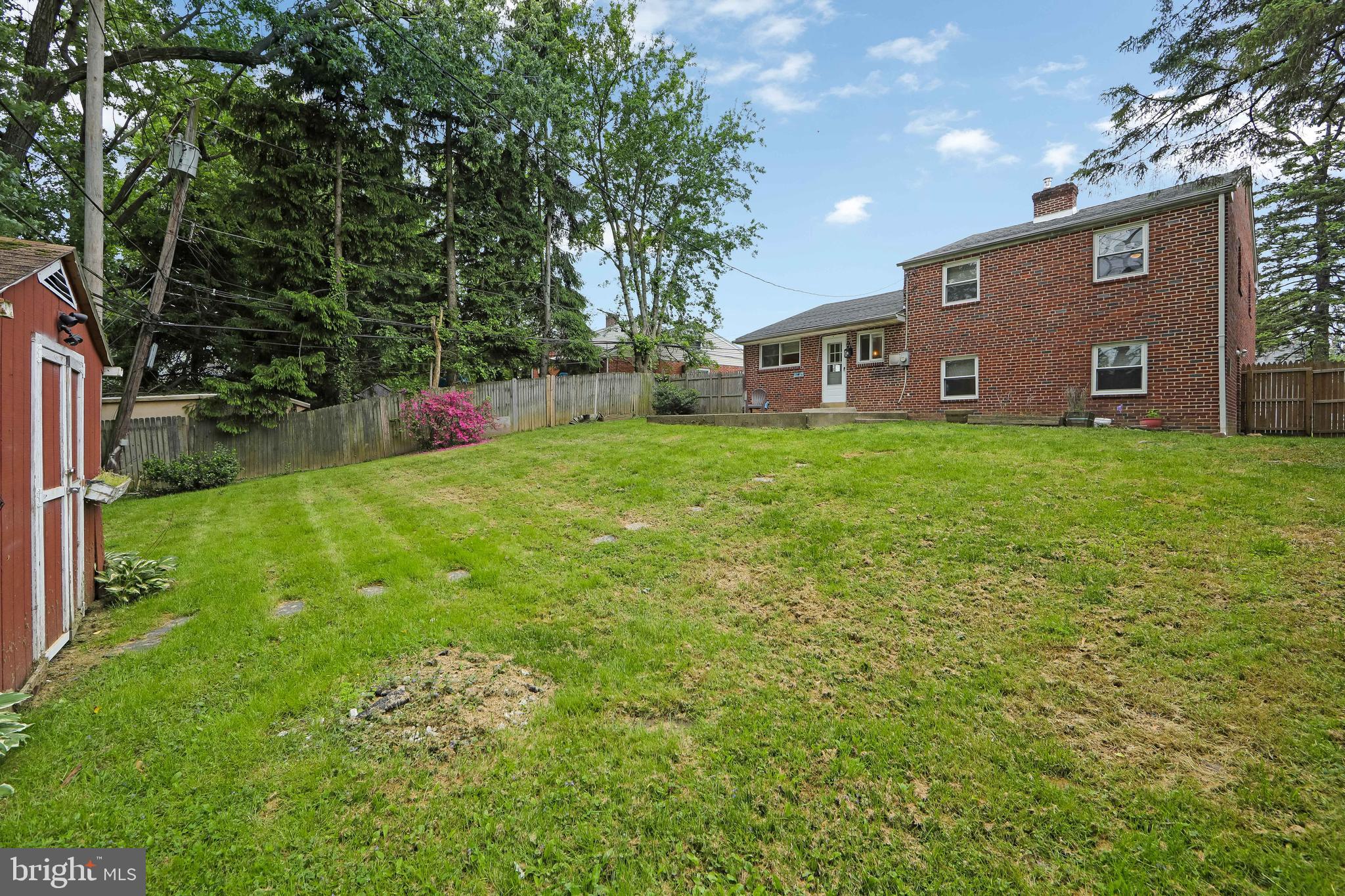 334 Parham Road Springfield, PA 19064 - Photo 34 of 41 a front view of house with yard and trees