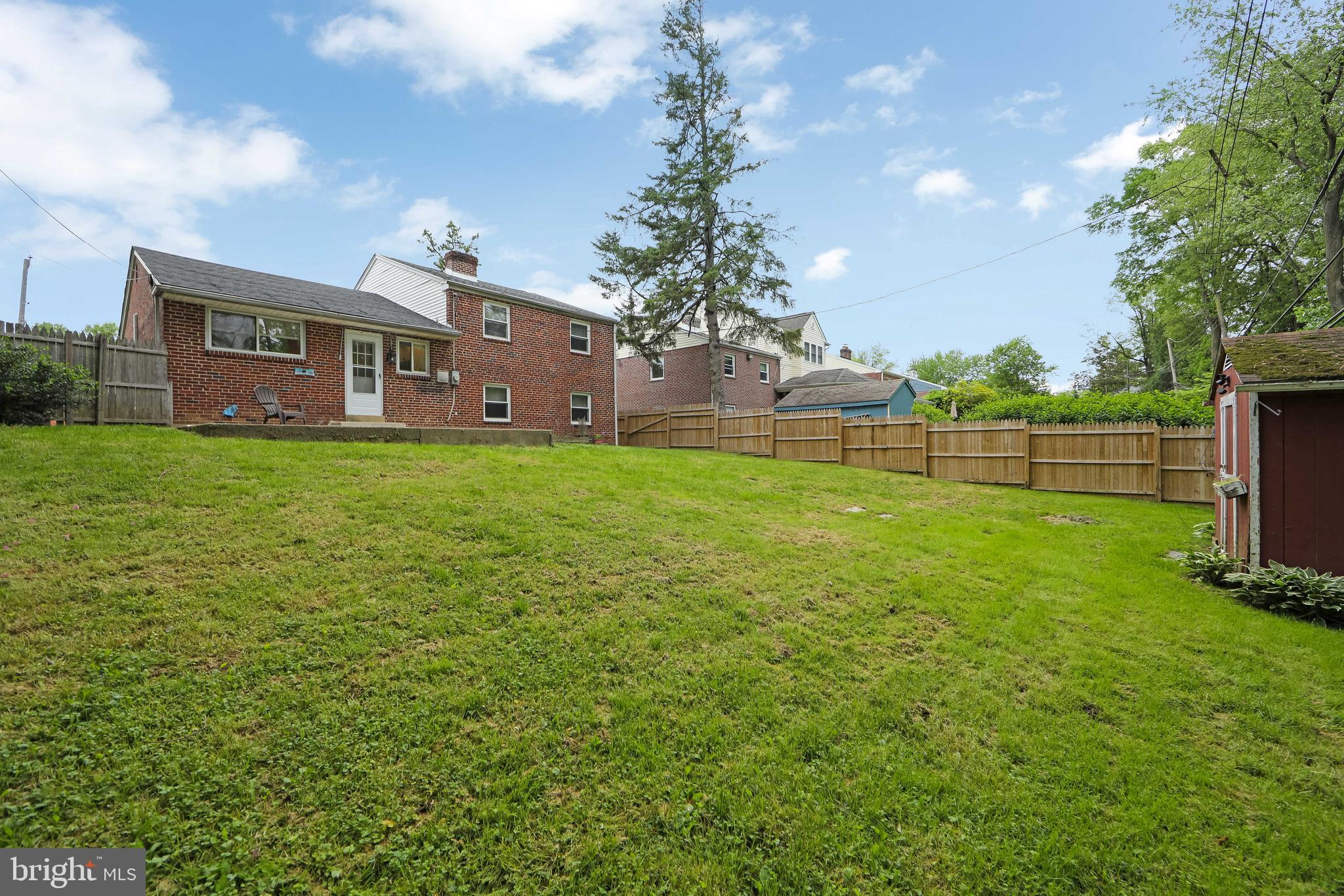 334 Parham Road Springfield, PA 19064 - Photo 35 of 41 a view of a house with a backyard
