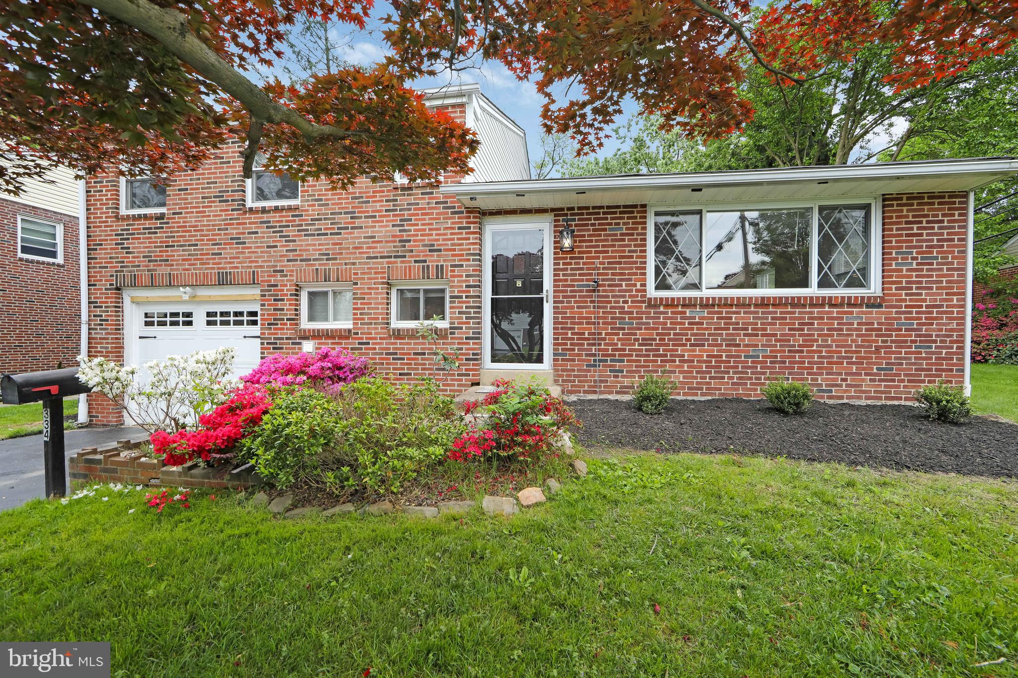 334 Parham Road Springfield, PA 19064 - Photo 6 of 41 a front view of house with yard