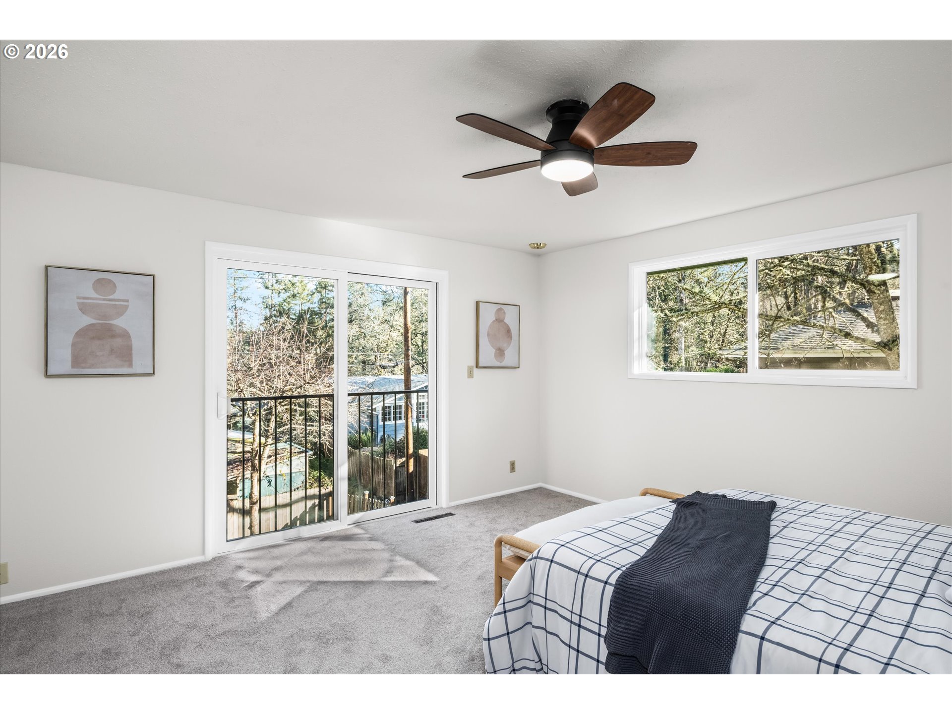 195 Coachman Drive Eugene, OR 97405 - Photo 16 of 34 a bedroom with furniture and a window