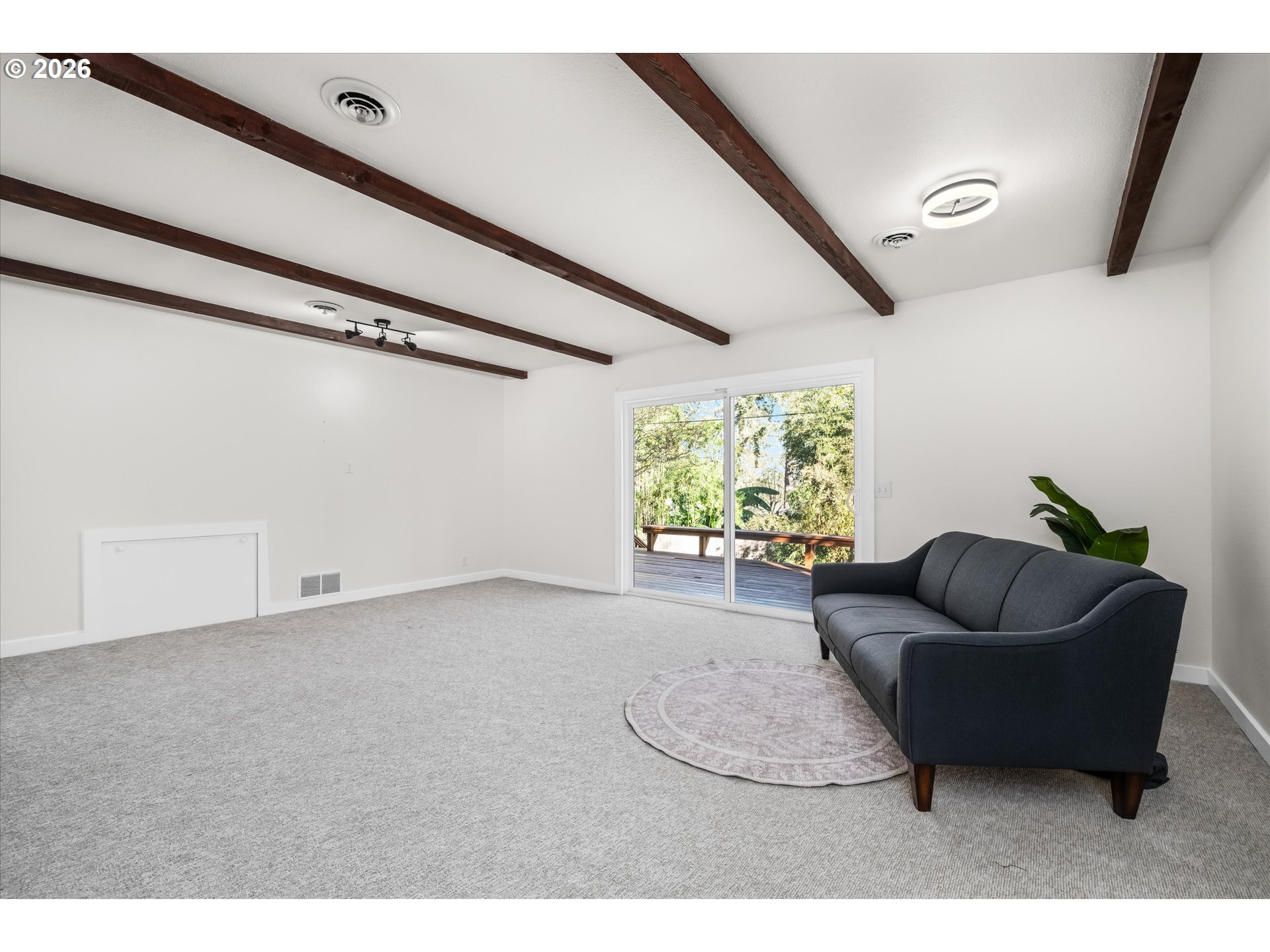 195 Coachman Drive Eugene, OR 97405 - Photo 26 of 34 a living room with furniture and a window