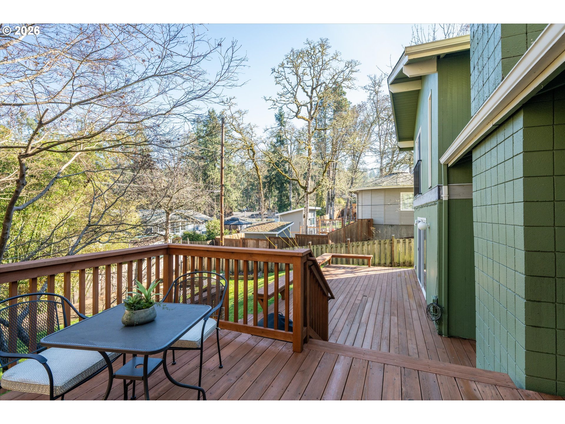 195 Coachman Drive Eugene, OR 97405 - Photo 28 of 34 a view of a chairs and table on the balcony