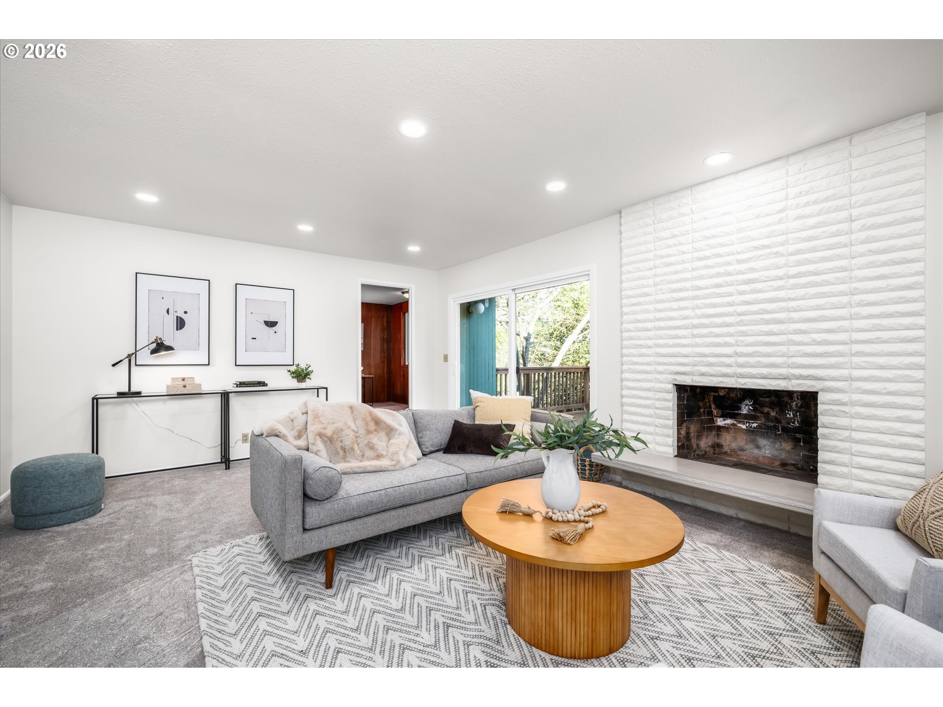 195 Coachman Drive Eugene, OR 97405 - Photo 3 of 34 a living room with furniture and a fireplace