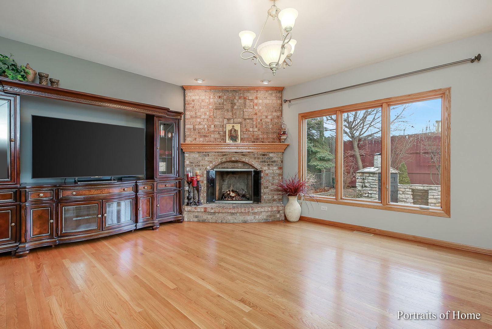 655 Mary Court Elmhurst, IL 60126 - Photo 14 of 46 a view of a livingroom with furniture window and a fireplace