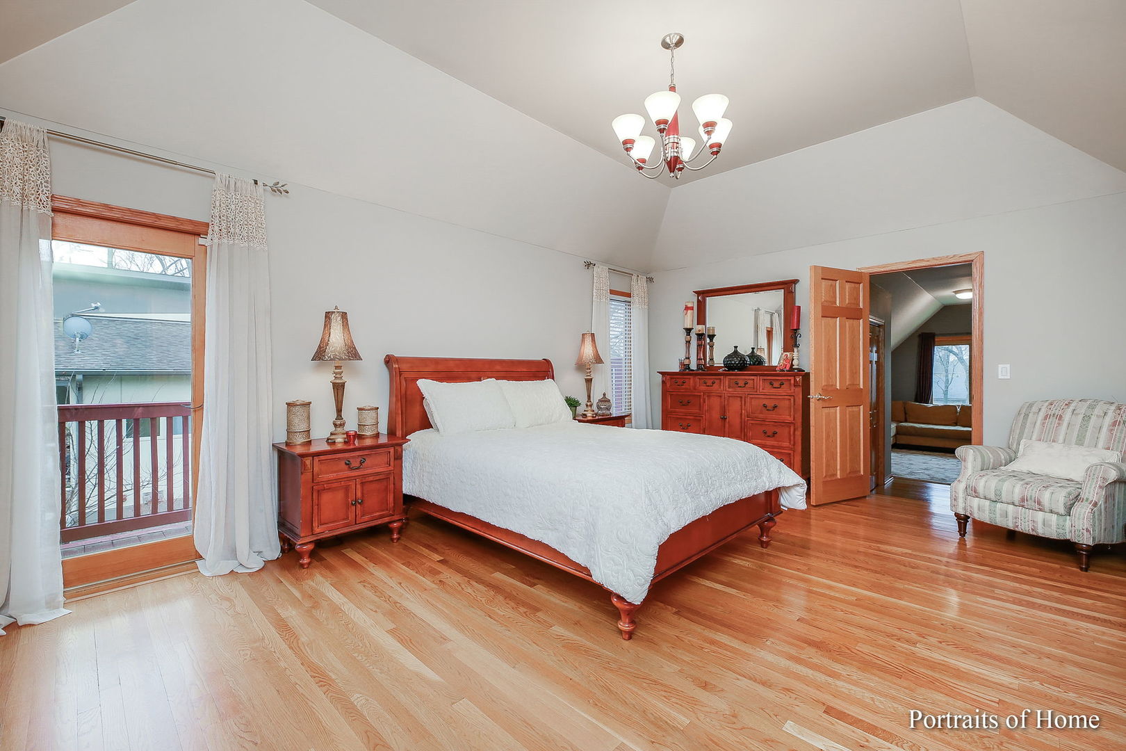 655 Mary Court Elmhurst, IL 60126 - Photo 22 of 46 a spacious bedroom with a bed and wooden floor